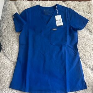 Winning blue size XXS figs scrubs top